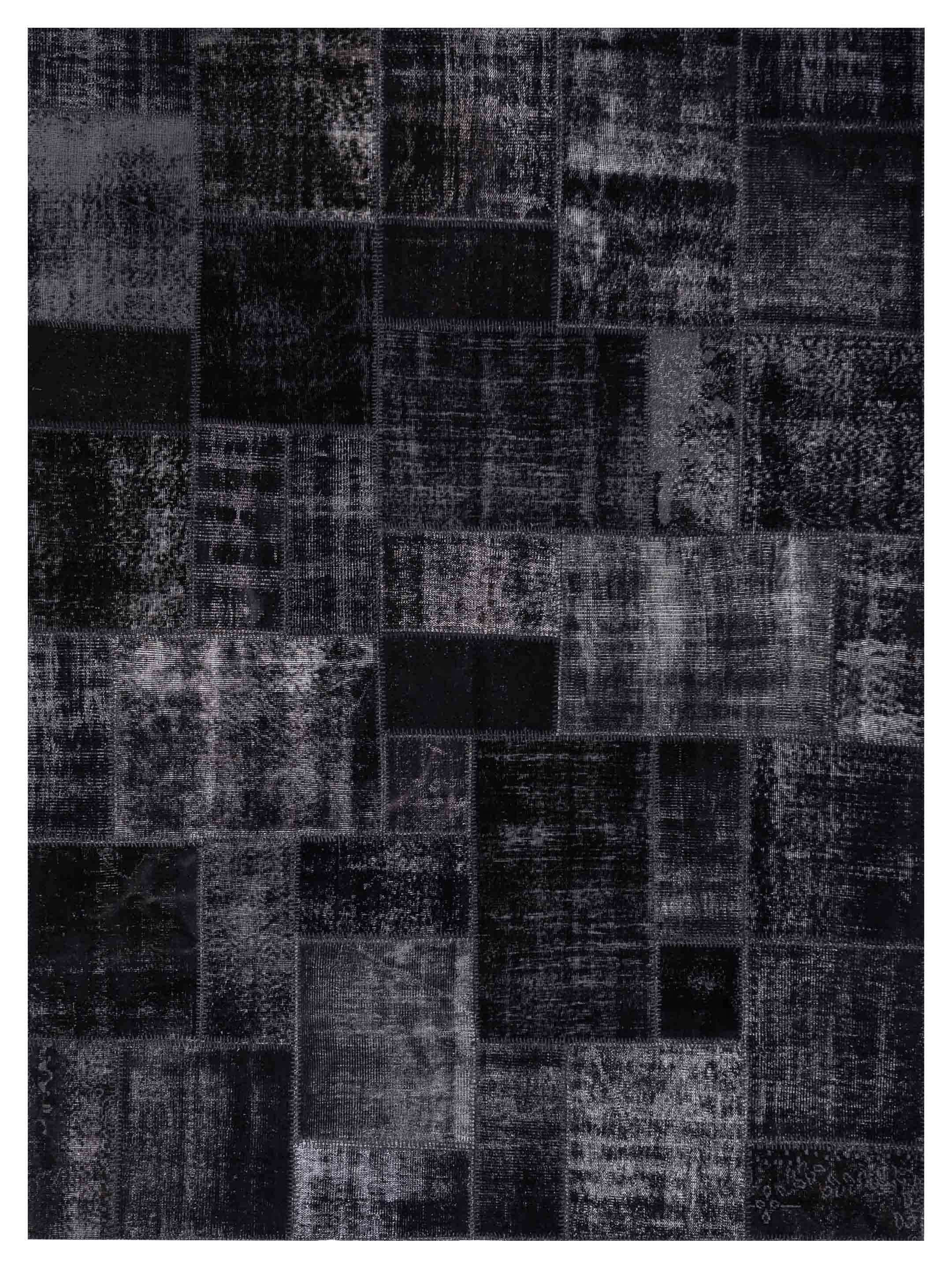 Black and white patchwork area rug